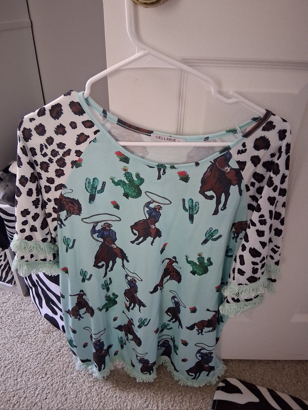 Women's Cellabie animal print rodeo top